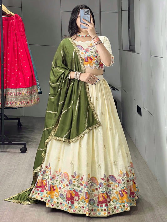 Marvelous Cream Embroidery Silk Lehenga Choli With Green Dupatta