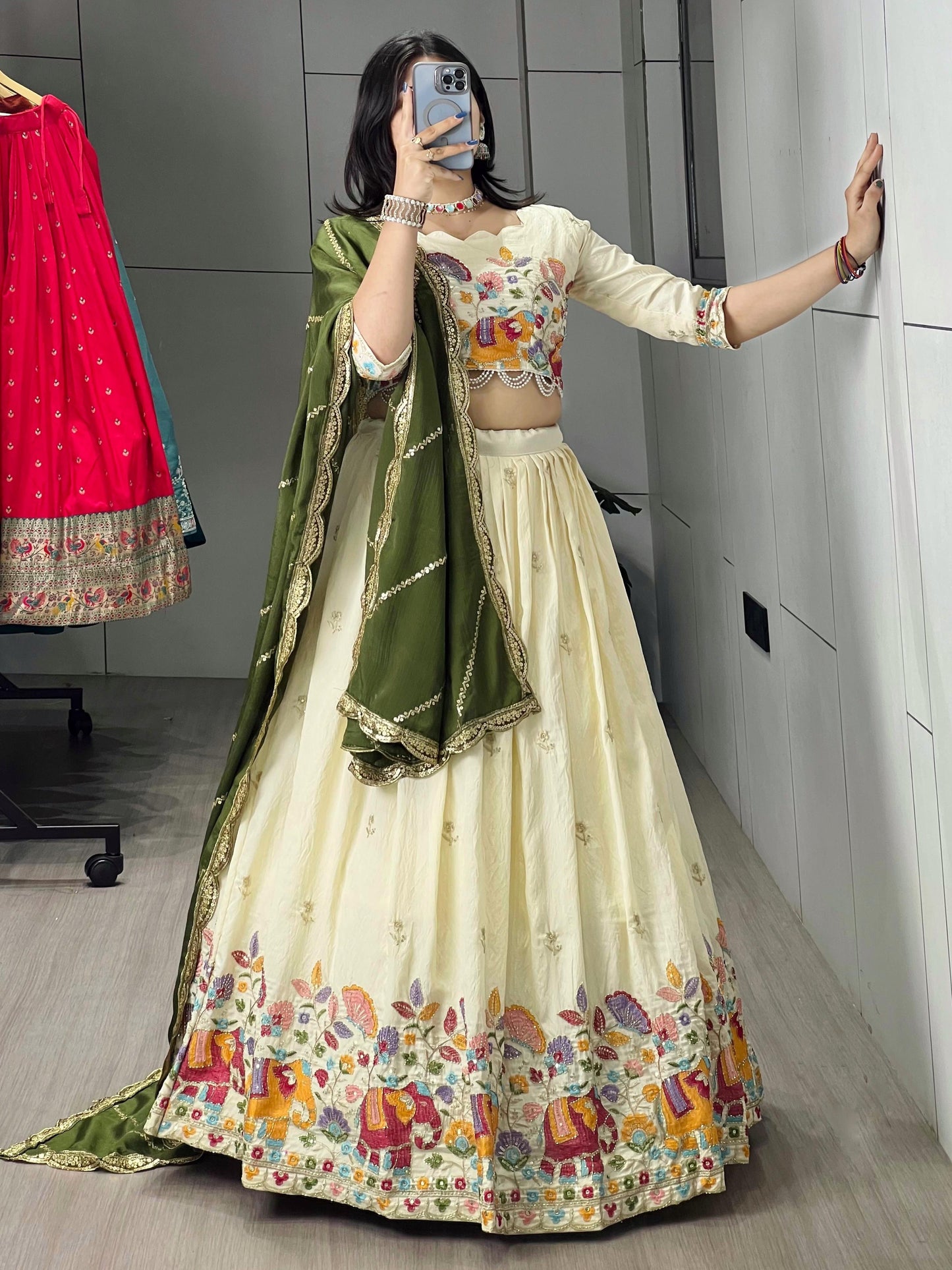 Marvelous Cream Embroidery Silk Lehenga Choli With Green Dupatta