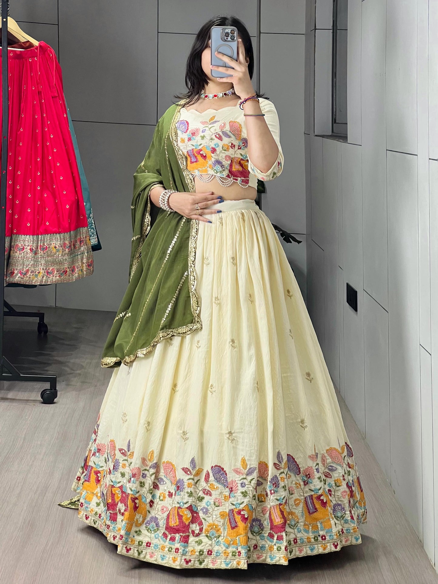 Marvelous Cream Embroidery Silk Lehenga Choli With Green Dupatta
