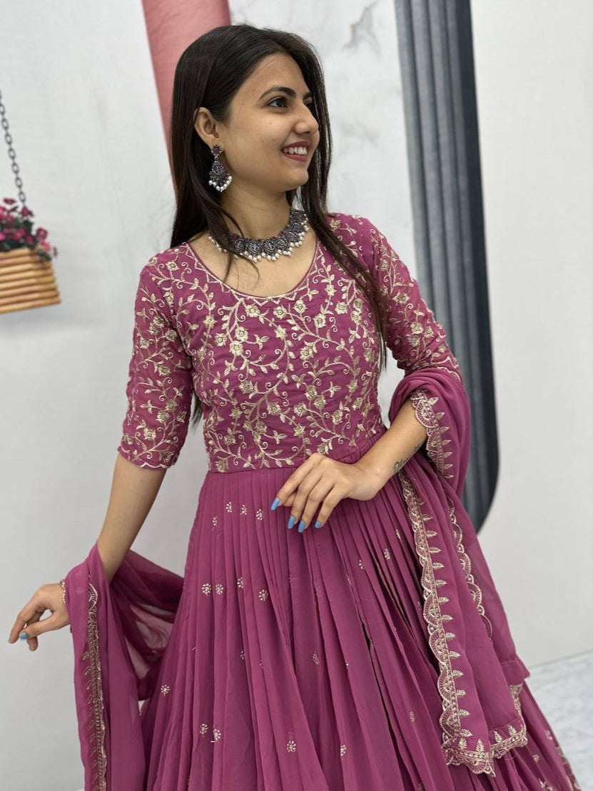 Marvelous Pink Embroidered Georgette Reception Wear Gown