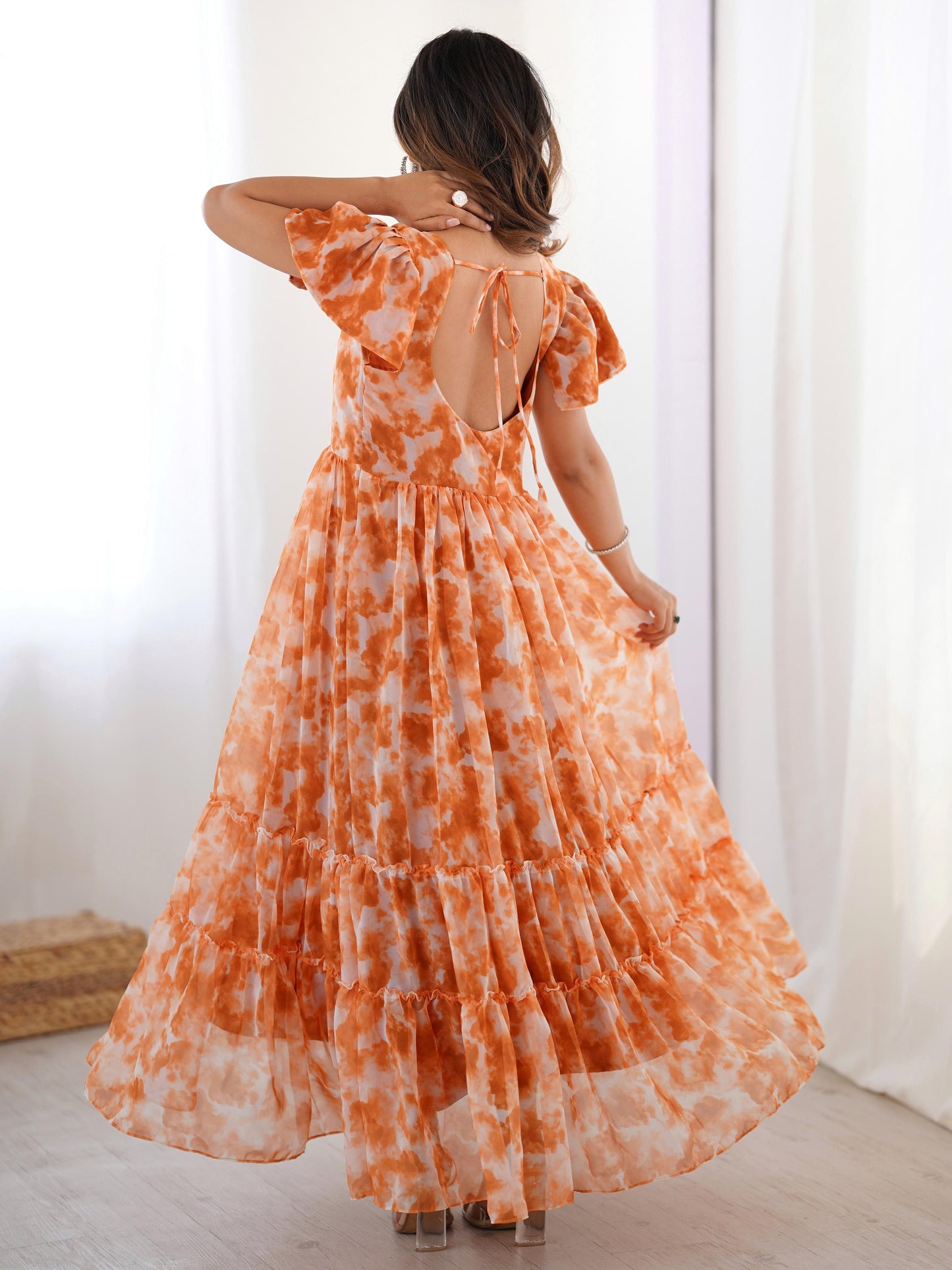 Beautiful Orange Printed Georgette Casual Wear Gown