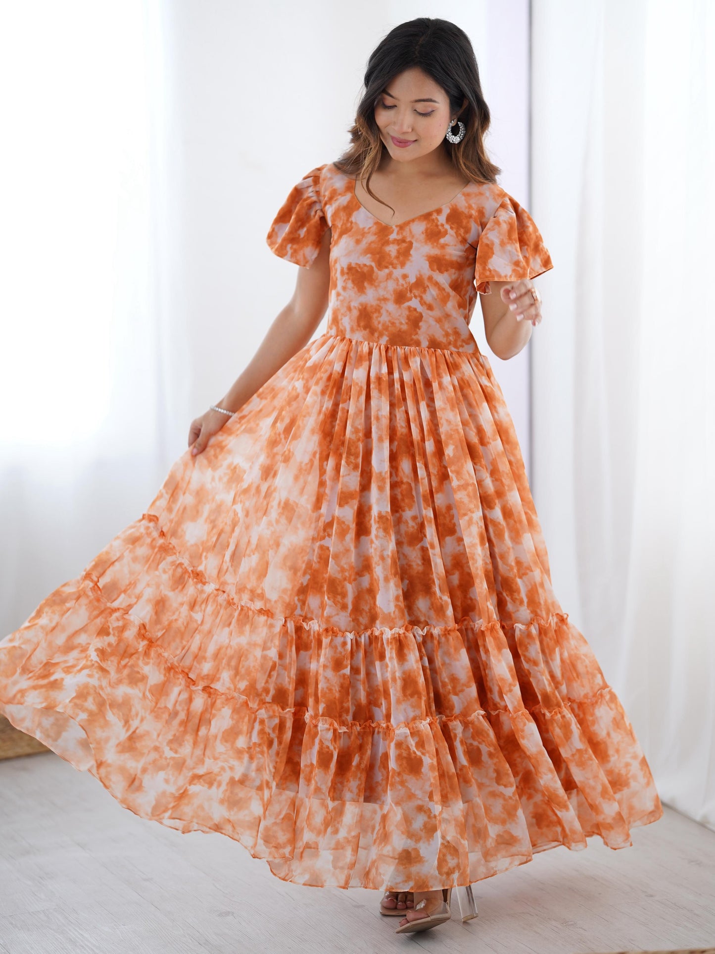 Beautiful Orange Printed Georgette Casual Wear Gown