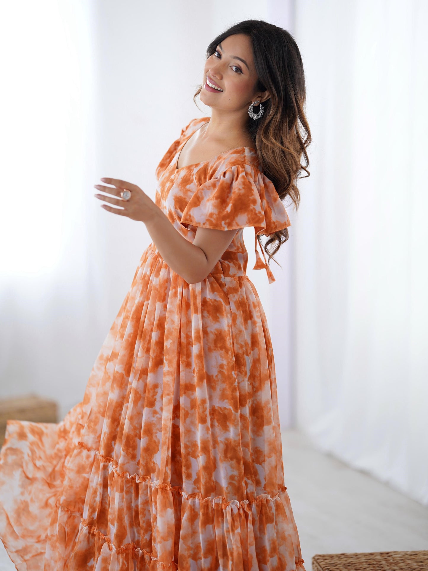 Beautiful Orange Printed Georgette Casual Wear Gown